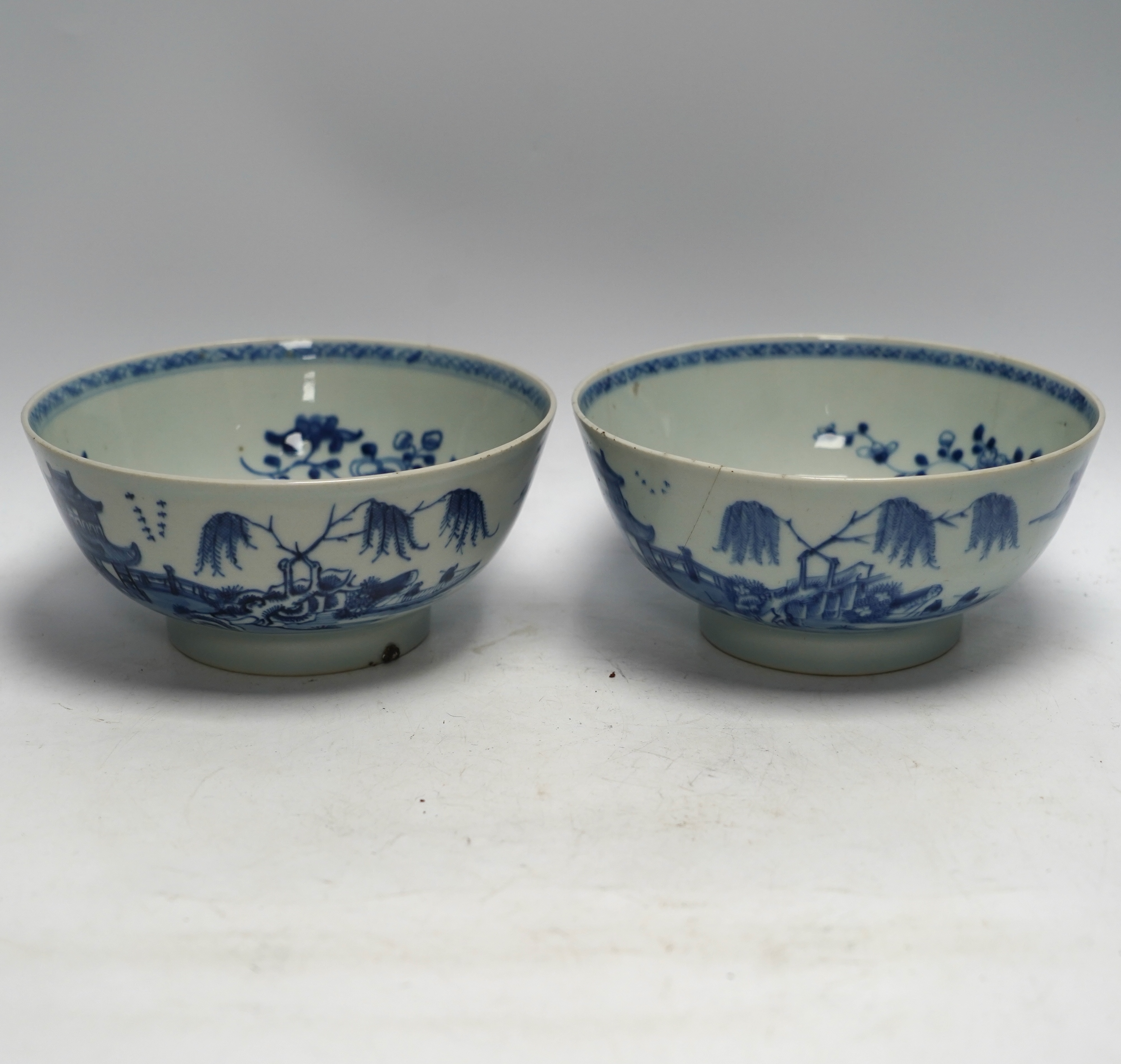 A group of 18th century Chinese and Japanese porcelain including blue and white bowls and jar with hardwood cover, largest 19cm in diameter